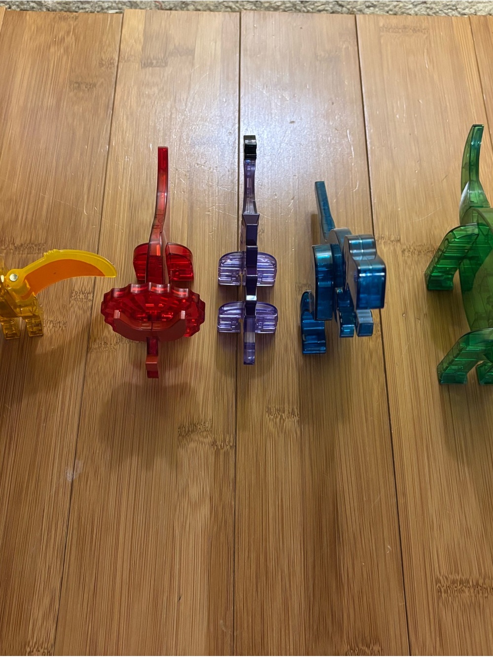 Translucent Dinosaur Figure Pack - Red, Purple, Blue, Green